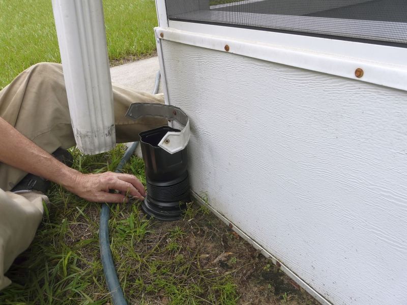 Attaching Downspouts to the Home